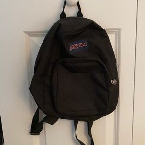 Black Jansport mini backpack